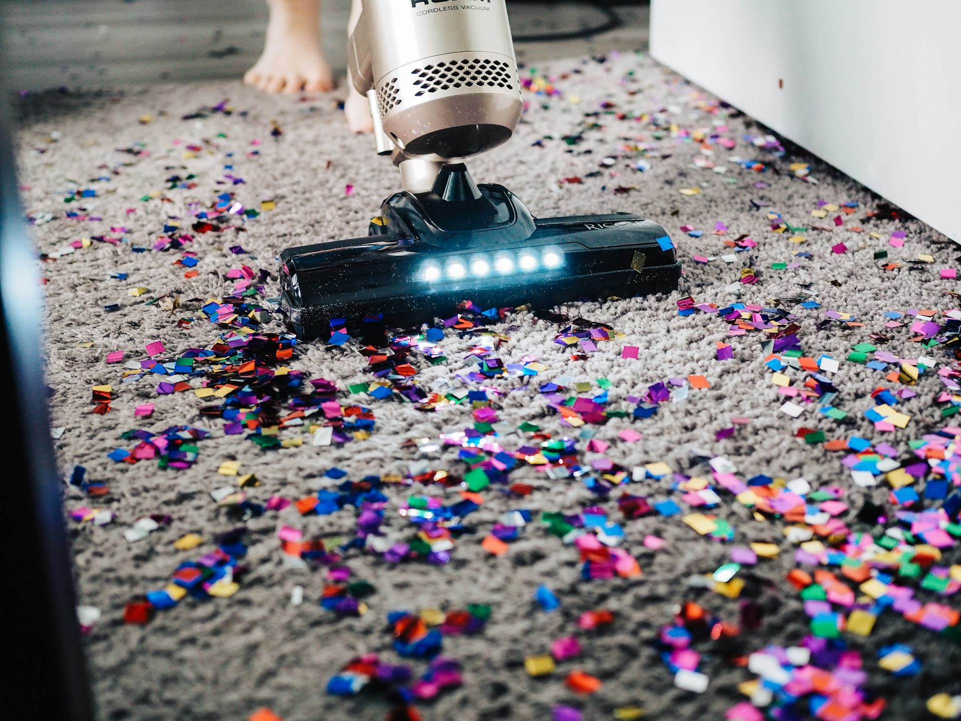 Vacuuming confetti after a house party