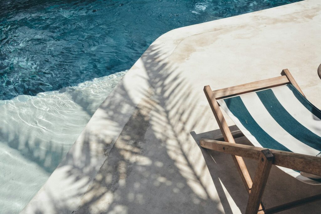 Lounge chair by a pool