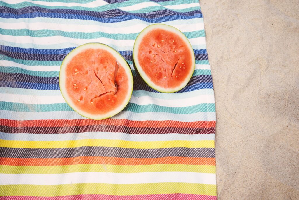 Watermelon on a beach towel